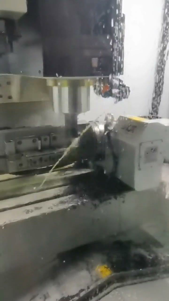 Frame from the Reel showing CNC machining of a tooling fixture component for packaging equipment