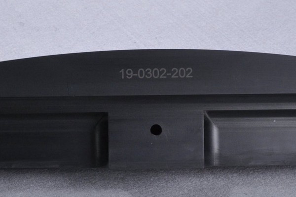 Laser etching plastic part