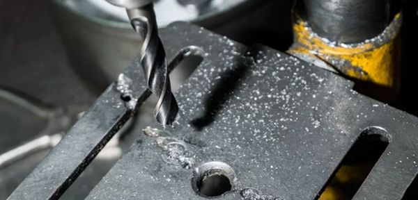 drill the hole on the metal