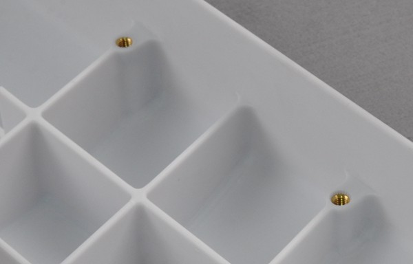 insert molding with brass nuts